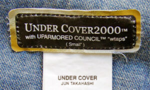 UNDERCOVER（アンダーカバー）× WTAPS（ダブルタップス）の2000年春夏の時のロゴタグ